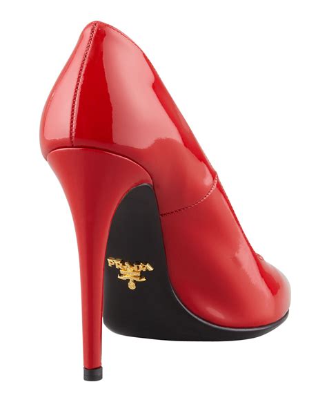 prada pumps with red under nottom